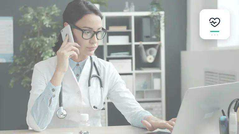 Doctor handling a confidential phone call at work with healthcare and privacy symbol – editorial image for “Business debt collection in healthcare: how to keep billing documents complete”.